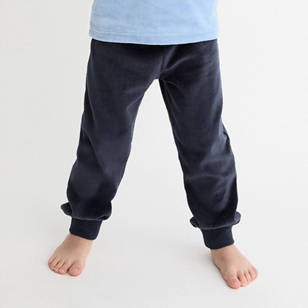 Pantalón largo azul marino con puños del pijama infantil tundosado