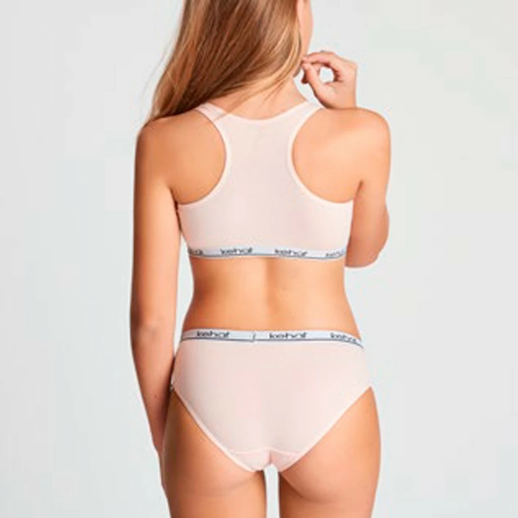 Conjunto top deportivo sin relleno y braga bikini para niña Kehat